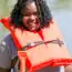 teen with intellectual disability getting ready to kayak at an inclusive camp